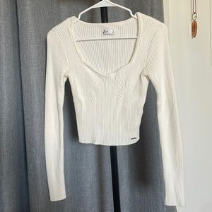 Knit long sleeved sweater top